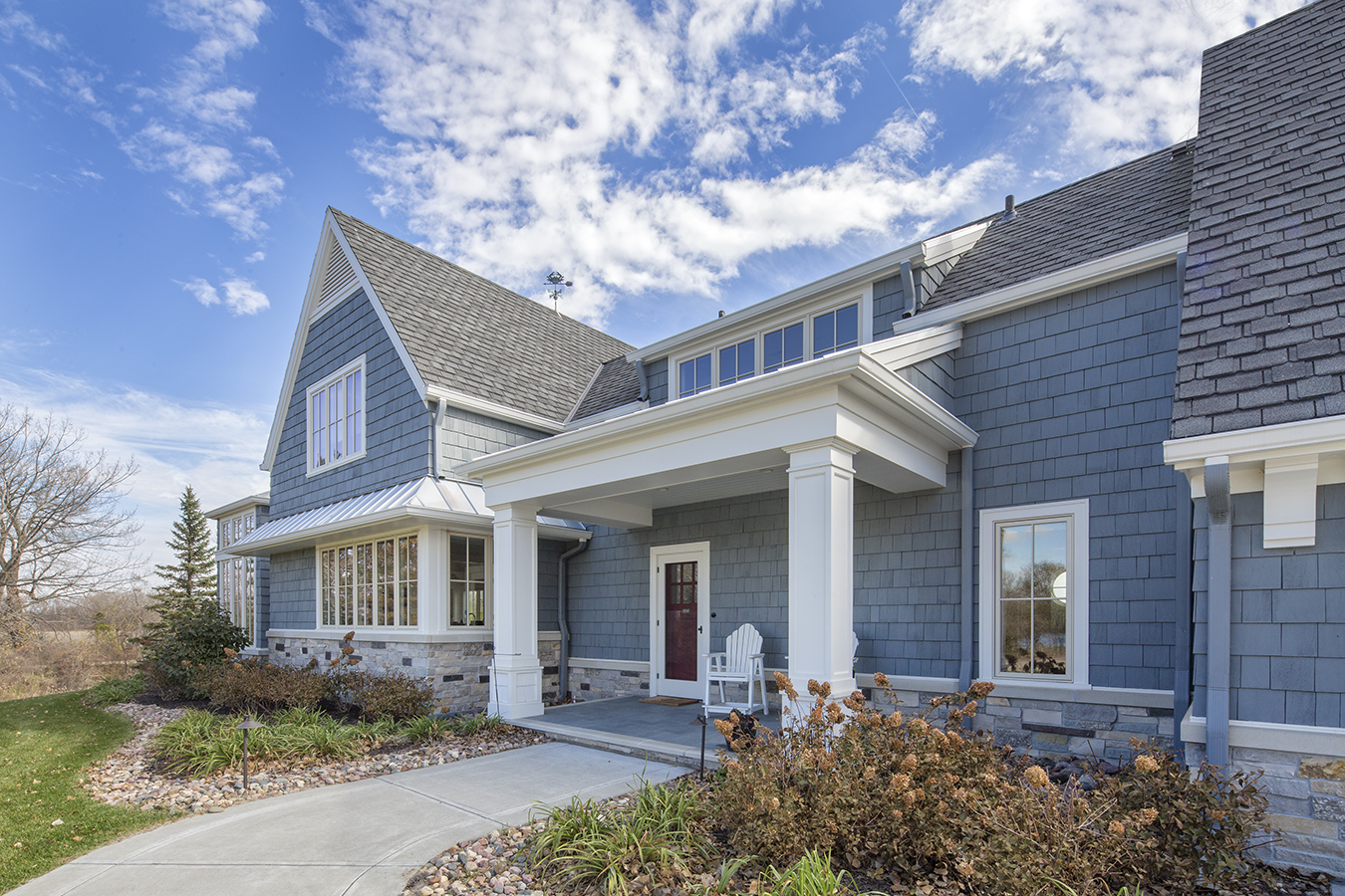Traditional style home with blue siding