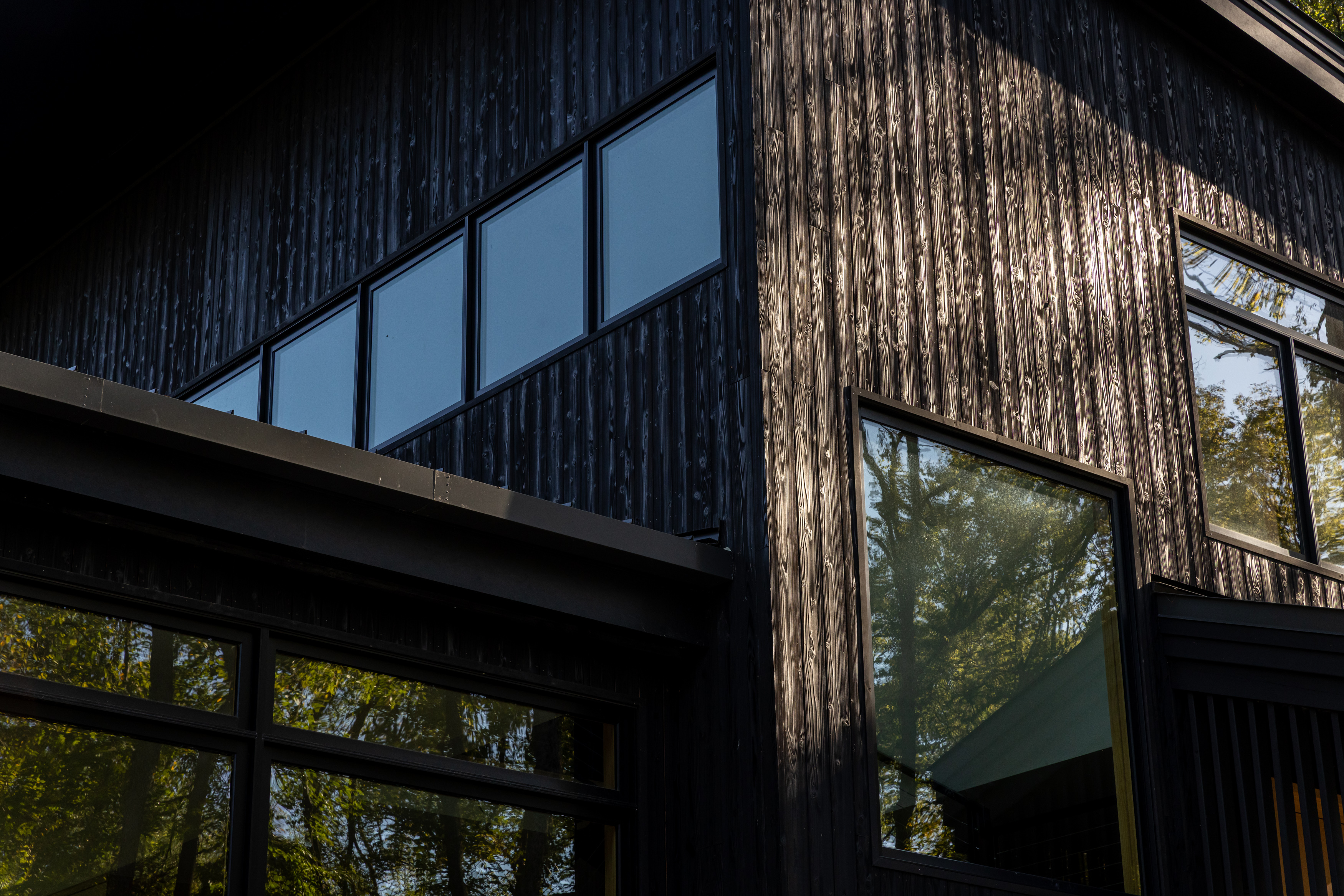Contemporary exterior with wood accents